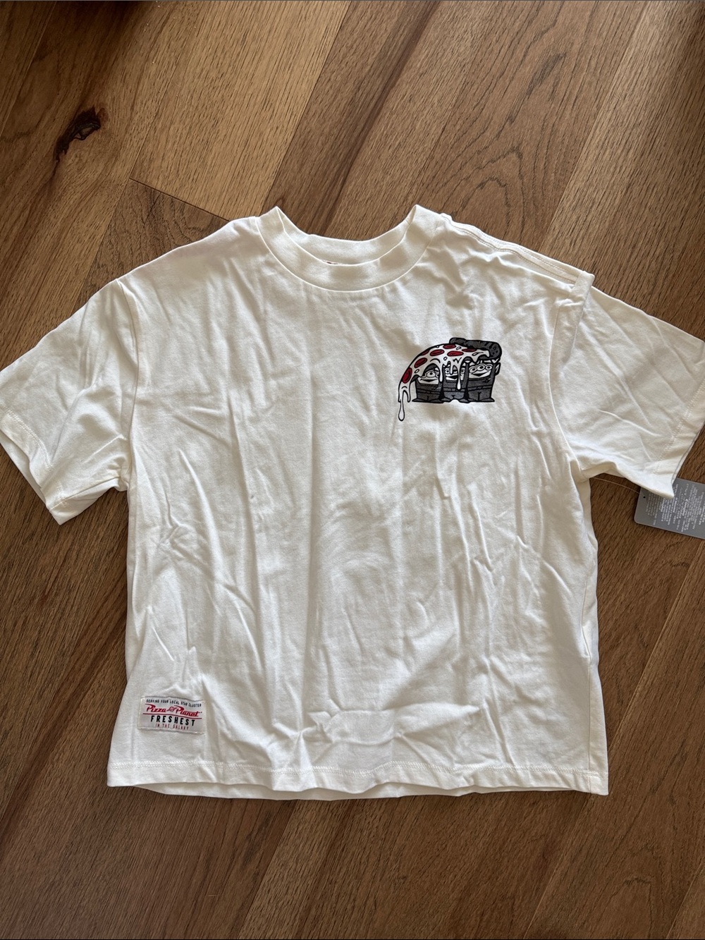 NWT Disney Toy Story Pizza Planet T-Shirt, in ivory, size small